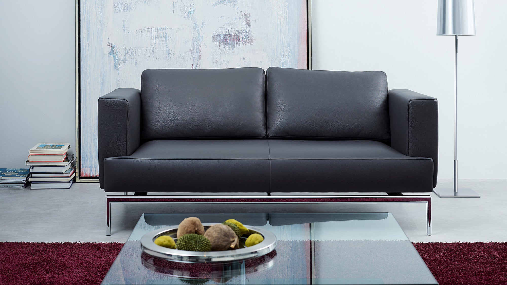 Schwarzes Ledersofa von Frank Sitzmöbel FSM, elegant und zeitloses Design für stilvolle Räume.